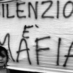 Palermo , September 1993 - Demo against the killing of Father Puglisi - A female child in front of a banner with the writing " Silence is Mafia " 

Palermo , settembre 1993 - Protesta contro la mafia per l'uccisione di Padre Pugliesi - Una bambina di fronte ad uno striscione con la scritta " Il silenzio è mafia "  *** Local Caption *** 00127716